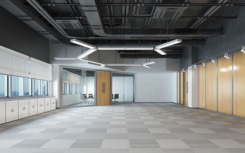 Office interior with patterned carpet tiles designed for comfort and practicality.