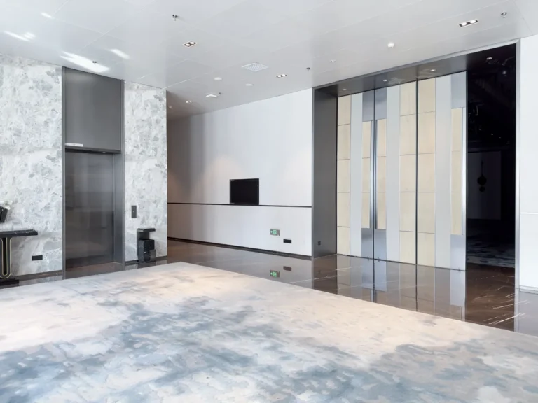Modern hotel lobby interior with a large carpet