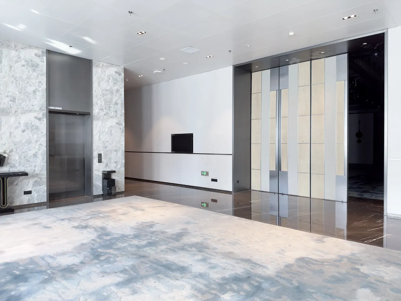 Modern hotel lobby interior with a large carpet